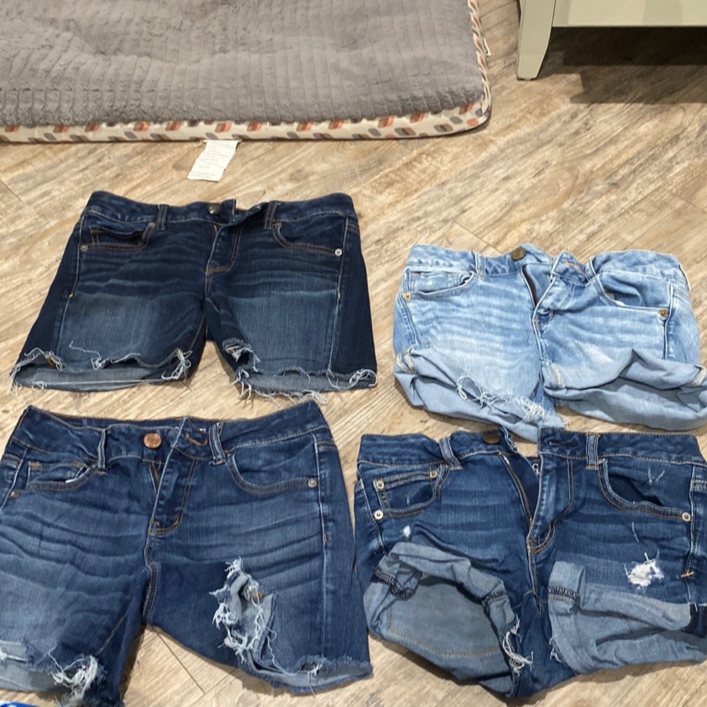 Four pair of jean American Eagle shorts